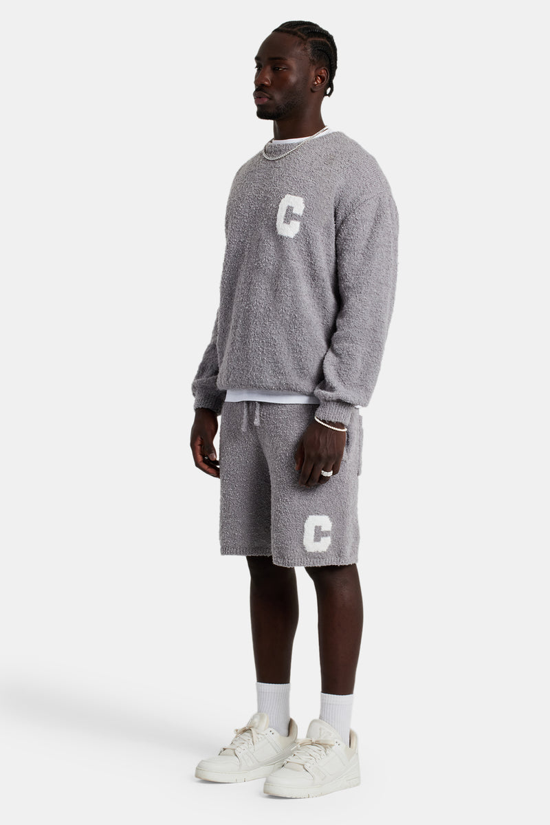 Male model wearing theTextured Knitted Sweatshirt Short Tracksuit in grey