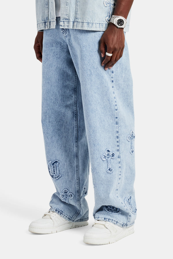 Raw Edge Applique Cross Baggy Jean - Light Blue