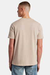 Male Model wearing Taupe T-shirt with C detail