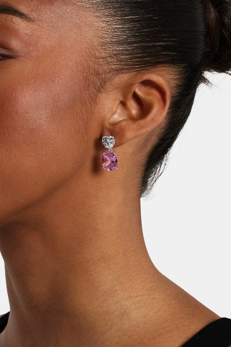 female model wearing Clear iced heart & oval drop earrings